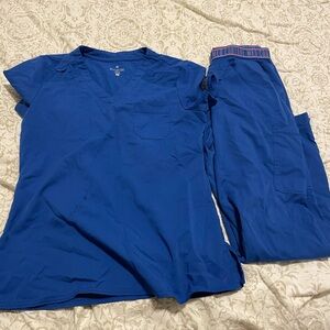 Blue scrubs med couture